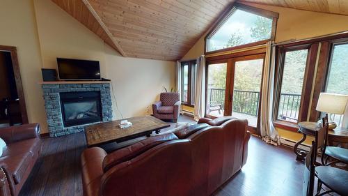 3988 Mcgiverin Road, Fernie, BC - Indoor Photo Showing Living Room With Fireplace
