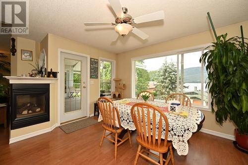875/877 Armentieres Road, Sorrento, BC - Indoor Photo Showing Dining Room With Fireplace