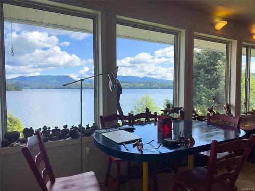 243 Harbour Rd, Coal Harbour, BC - Indoor Photo Showing Dining Room With Body Of Water
