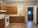 108 1St Avenue Ne, Ituna, SK  - Indoor Photo Showing Kitchen With Double Sink 