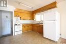 811 Galt Street, Whitewood, SK  - Indoor Photo Showing Kitchen With Double Sink 