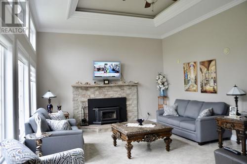 15 Reichers Place, Gander, NL - Indoor Photo Showing Living Room With Fireplace
