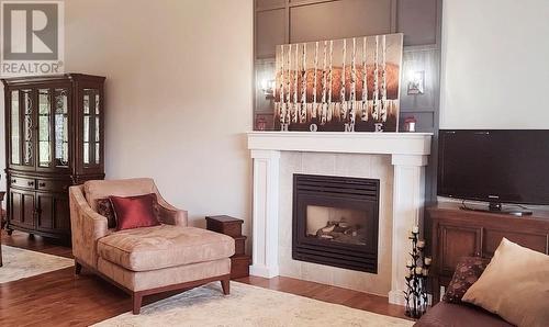 515 9Th Avenue, Burns Lake, BC - Indoor Photo Showing Living Room With Fireplace