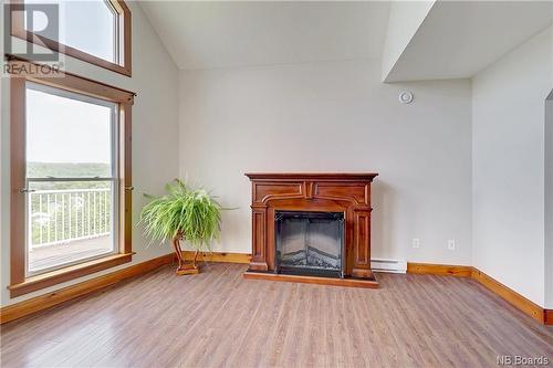 26 School Street, Meductic, NB - Indoor Photo Showing Living Room With Fireplace