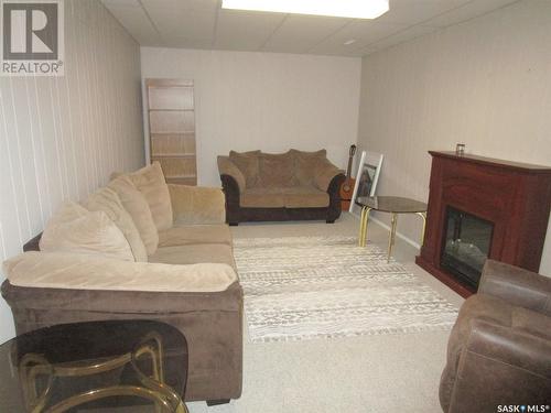 303 3Rd Avenue E, Assiniboia, SK - Indoor Photo Showing Living Room With Fireplace