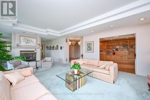 401 - 10 Armstrong Drive, Smiths Falls, ON - Indoor Photo Showing Living Room With Fireplace