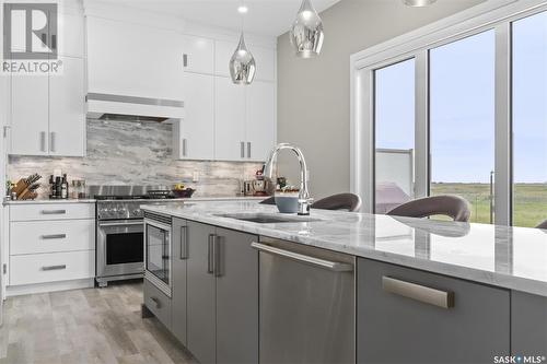 651 Bolstad Turn, Saskatoon, SK - Indoor Photo Showing Kitchen With Upgraded Kitchen