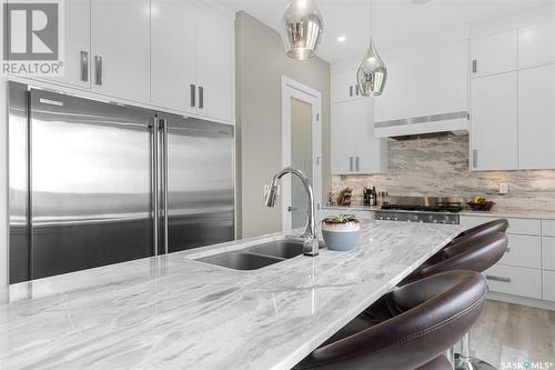 651 Bolstad Turn, Saskatoon, SK - Indoor Photo Showing Kitchen With Double Sink With Upgraded Kitchen