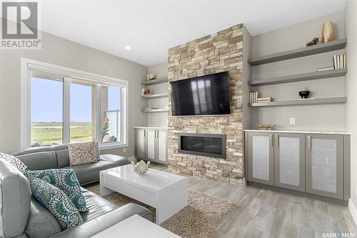 651 Bolstad Turn, Saskatoon, SK - Indoor Photo Showing Living Room With Fireplace