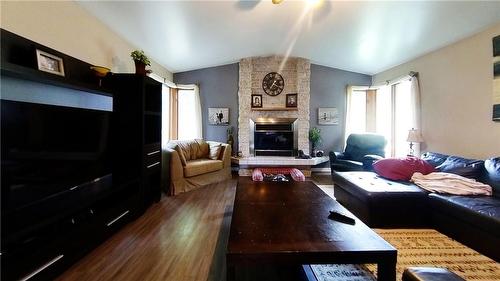140114 80 Road W, Hamiota, MB - Indoor Photo Showing Living Room With Fireplace