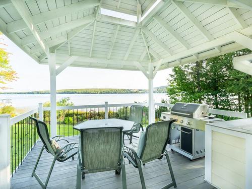 ExtÃ©rieur - 357 Rg Beau-Lac, Stratford, QC - Outdoor With Body Of Water With Deck Patio Veranda With Exterior