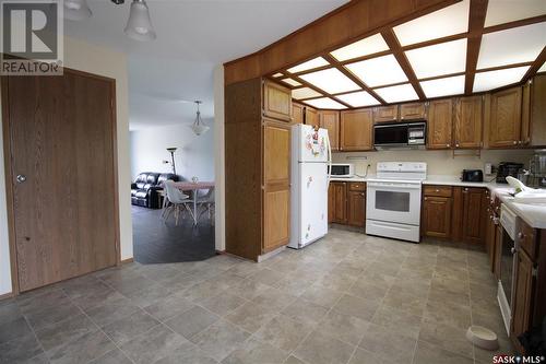 221 4Th Avenue, Whitewood, SK - Indoor Photo Showing Kitchen With Double Sink
