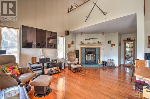 7825 China Valley Road, Falkland, BC - Indoor Photo Showing Living Room With Fireplace