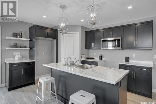 2456 Saunders Crescent, Regina, SK - Indoor Photo Showing Kitchen With Double Sink
