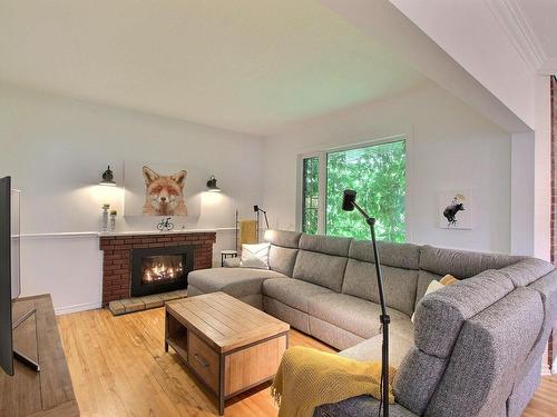 Salon - 120 10E Avenue, Senneterre - Ville, QC - Indoor Photo Showing Living Room With Fireplace