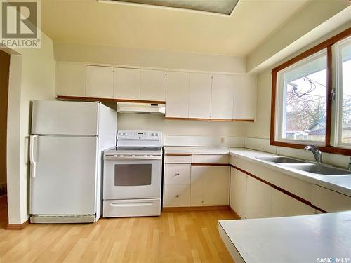 1132 Broadview Road, Esterhazy, SK - Indoor Photo Showing Kitchen With Double Sink