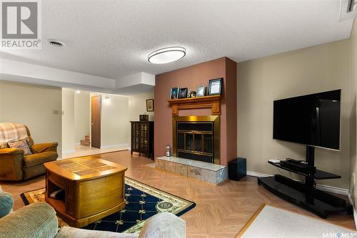106 Shaw Drive, Regina Beach, SK - Indoor Photo Showing Living Room With Fireplace