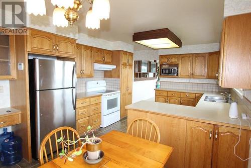 1416 Delkatla Street, Masset, BC - Indoor Photo Showing Kitchen With Double Sink