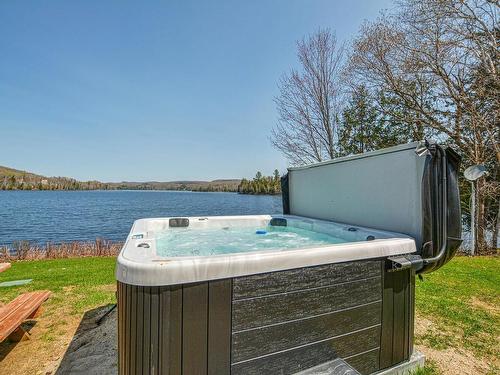 Spa - 77 Ch. Des Lacs, Chute-Saint-Philippe, QC - Outdoor With Body Of Water