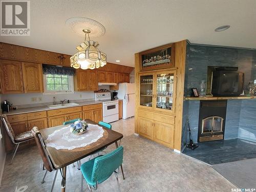 5 Christel Crescent, Lac Des Iles, SK - Indoor With Fireplace