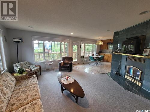 5 Christel Crescent, Lac Des Iles, SK - Indoor Photo Showing Living Room With Fireplace