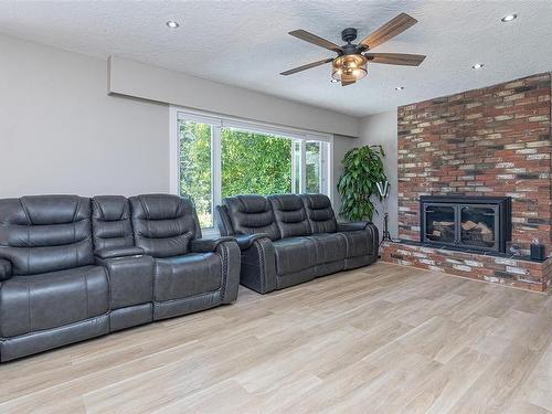 6974 Grant Rd West, Sooke, BC - Indoor Photo Showing Living Room With Fireplace
