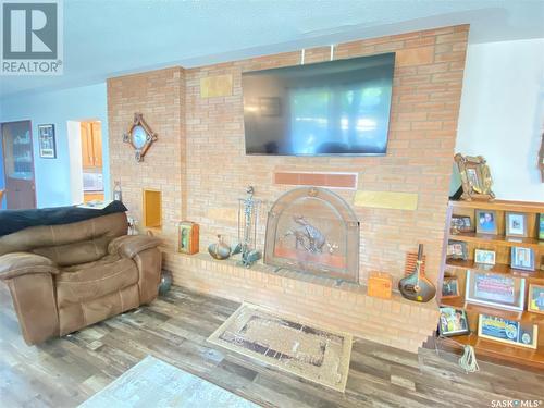 301 Aspen Street, Maple Creek, SK - Indoor Photo Showing Living Room With Fireplace