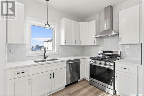 614 Delainey Road, Saskatoon, SK - Indoor Photo Showing Kitchen With Double Sink