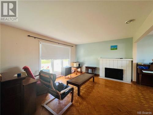 1130 Rockland Drive, Bathurst, NB - Indoor Photo Showing Living Room With Fireplace
