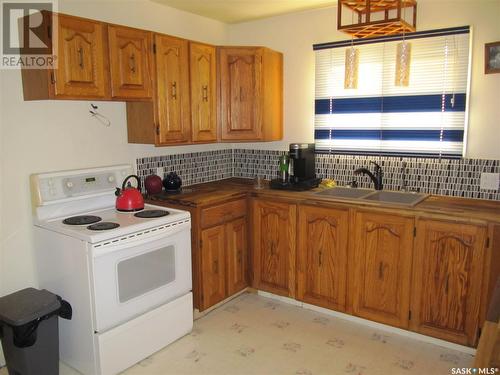141 2Nd Street W, St. Walburg, SK - Indoor Photo Showing Kitchen With Double Sink