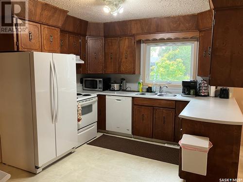 210 Maple Road E, Nipawin, SK - Indoor Photo Showing Kitchen With Double Sink
