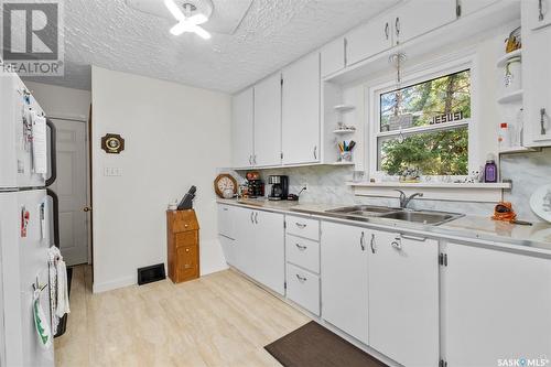 2 29Th Street E, Prince Albert, SK - Indoor Photo Showing Kitchen With Double Sink