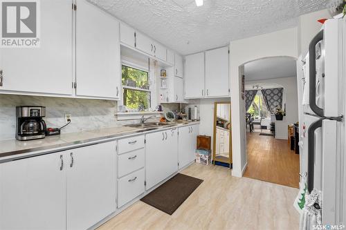 2 29Th Street E, Prince Albert, SK - Indoor Photo Showing Kitchen With Double Sink
