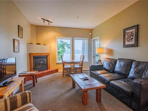 510-1971 Harbour Dr, Ucluelet, BC - Indoor Photo Showing Living Room With Fireplace