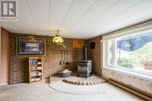 2224 County Road 17, Prince Edward County, ON - Indoor With Fireplace
