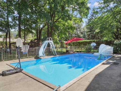 Pool - 435 Rue Du Prince-Edward, Otterburn Park, QC - Outdoor With In Ground Pool With Backyard
