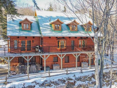 Back facade - 131 Ch. Au Pied-De-La-Pente-Douce, Mont-Tremblant, QC - Outdoor With Deck Patio Veranda