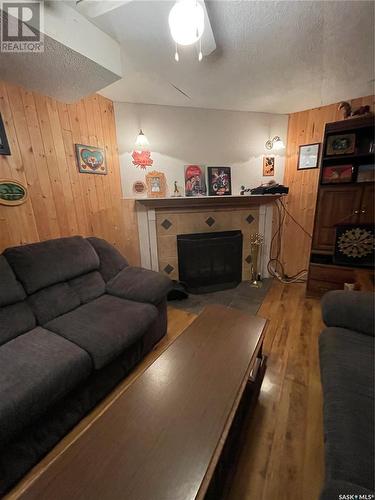 35 Acres, Hudson Bay Rm No. 394, SK - Indoor Photo Showing Living Room With Fireplace