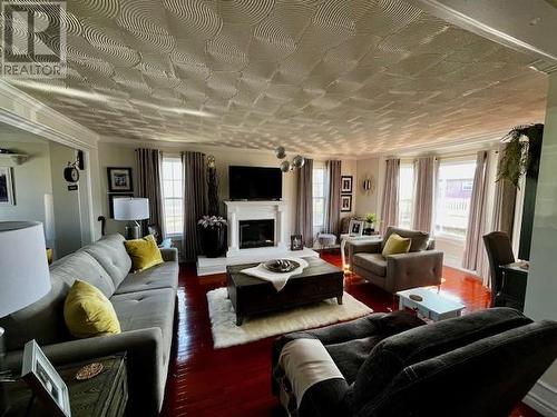 15 Butler Crescent, Bonavista, NL - Indoor Photo Showing Living Room With Fireplace