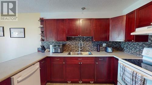 10818 102 Street, Fort St. John, BC - Indoor Photo Showing Kitchen With Double Sink