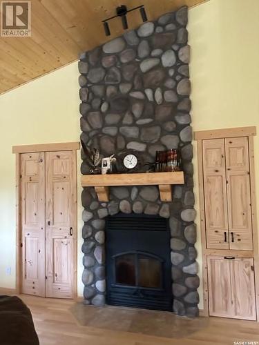 1411 Miniyak Cres Napatak B, Lac La Ronge, SK - Indoor With Fireplace