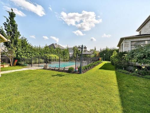 Pool - 3845 Rue De Louviers, Brossard, QC - Outdoor With In Ground Pool With Backyard
