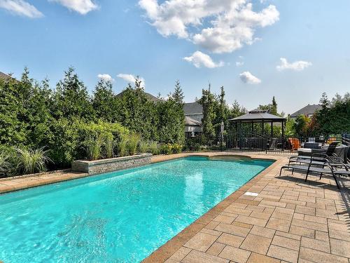 Backyard - 3845 Rue De Louviers, Brossard, QC - Outdoor With In Ground Pool With Backyard