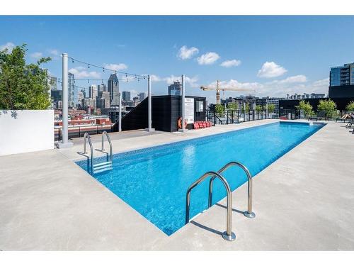 Piscine - Ph 812-1550 Rue Des Bassins, Montréal (Le Sud-Ouest), QC - Outdoor With In Ground Pool