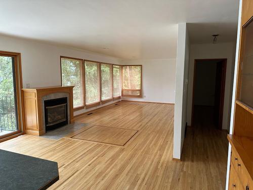 1832 Highway 3A, Nelson, BC - Indoor Photo Showing Living Room With Fireplace