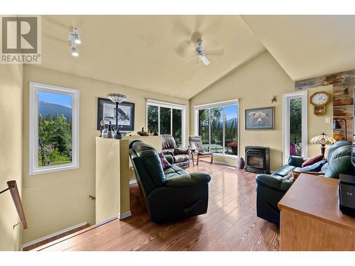 11899 L'Heureux Road, Valemount, BC - Indoor Photo Showing Living Room With Fireplace