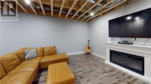 35 Boutot Lane, Dsl De Grand-Sault/Falls, NB - Indoor Photo Showing Basement With Fireplace