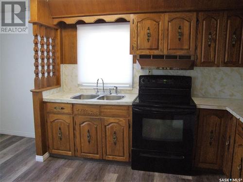 242 Main Street, Leader, SK - Indoor Photo Showing Kitchen With Double Sink