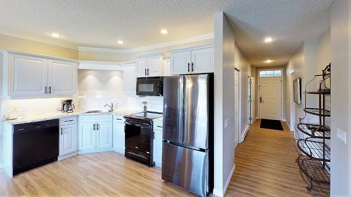 104 K - 100 Bighorn Boulevard, Radium Hot Springs, BC - Indoor Photo Showing Kitchen With Upgraded Kitchen