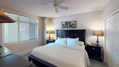 104 K - 100 Bighorn Boulevard, Radium Hot Springs, BC - Indoor Photo Showing Bedroom